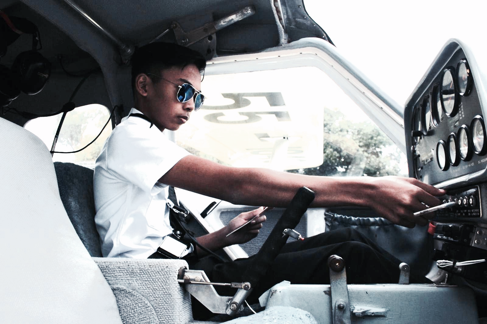 Student pilot in cockpit training for Recreational Pilot Certificate Singapore